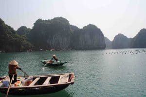 Woman on a boat on a river in Vietnam